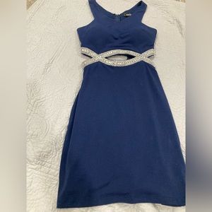Small, navy blue dress open sequence stomach, padding, zipper.